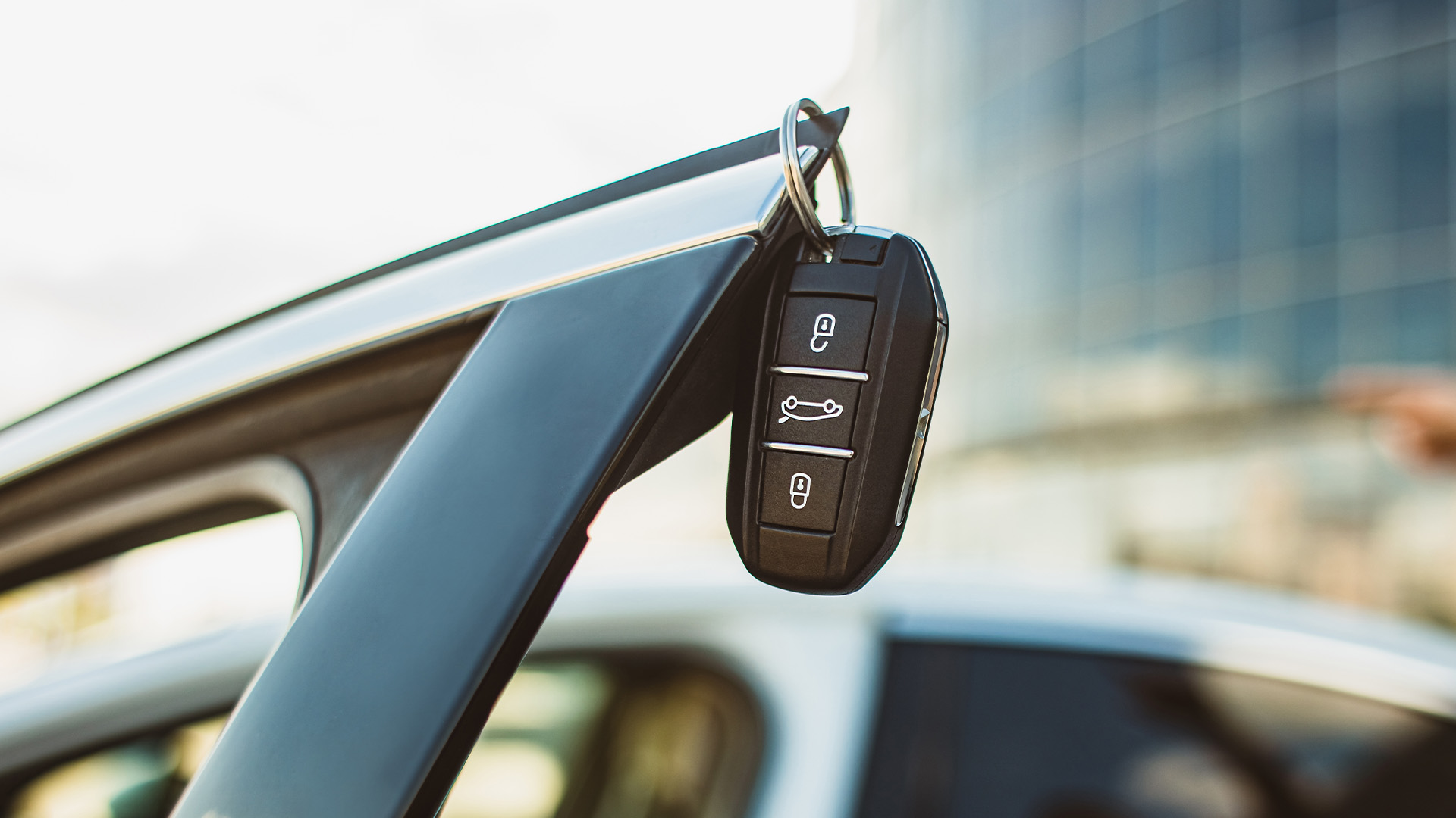 a set of spare keys hanging on a car door